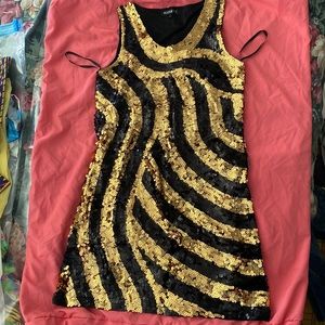 Runaway pairs sequenced dress